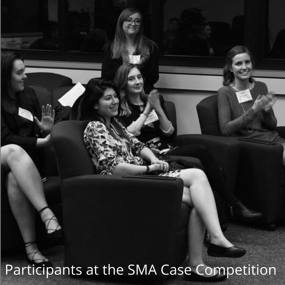 Students sitting in armchairs, titled "Participants at the SMA Case Competition"