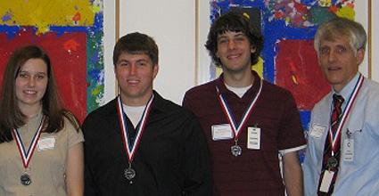 Students and faculty wearing medals
