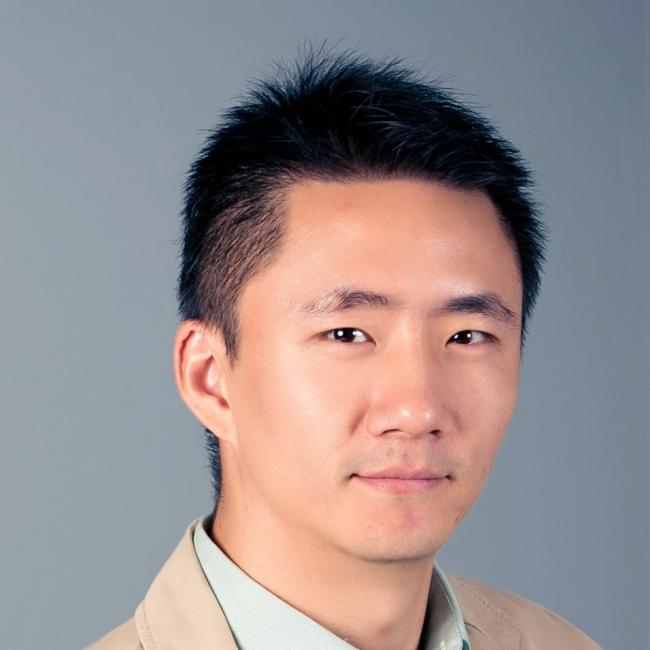 Dr. Jiexun Li wearing tan jacket